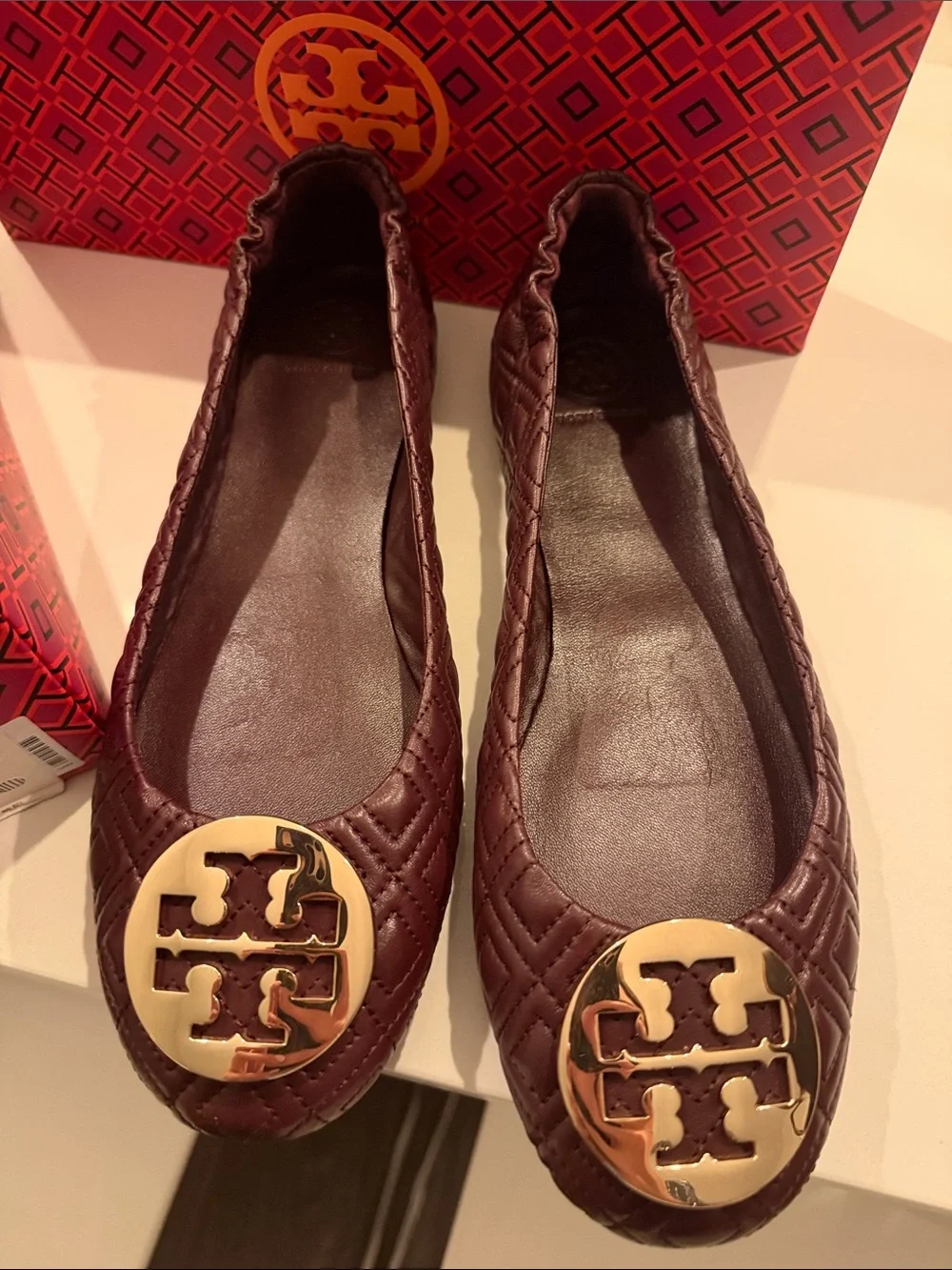 Tory Burch Quilted Leather Ballet Flats in Deep Burgundy with Gold Logo